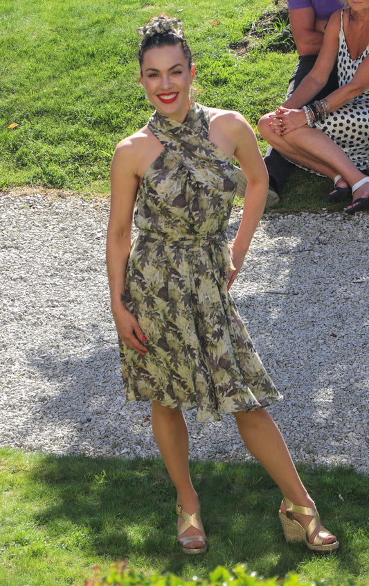 Chrystal Sloane Leaf Print Silk Dress with crossover front.